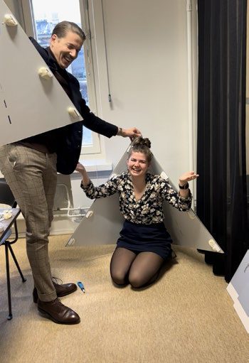 The finished one-metre prop pyramid with a person standing beside it
